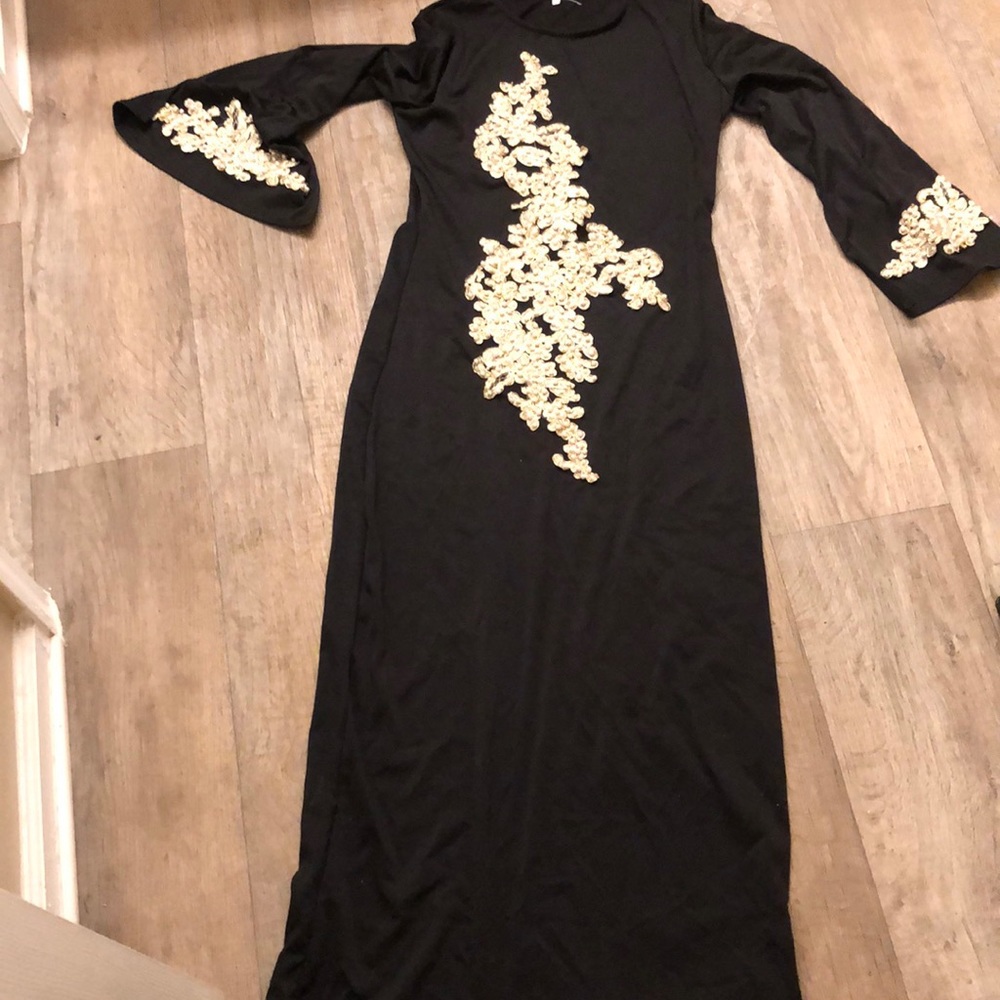 Brand new stylish black dress with gold and pearls